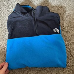 Blue and black north face quarter zip! size large. Hardly ever worn